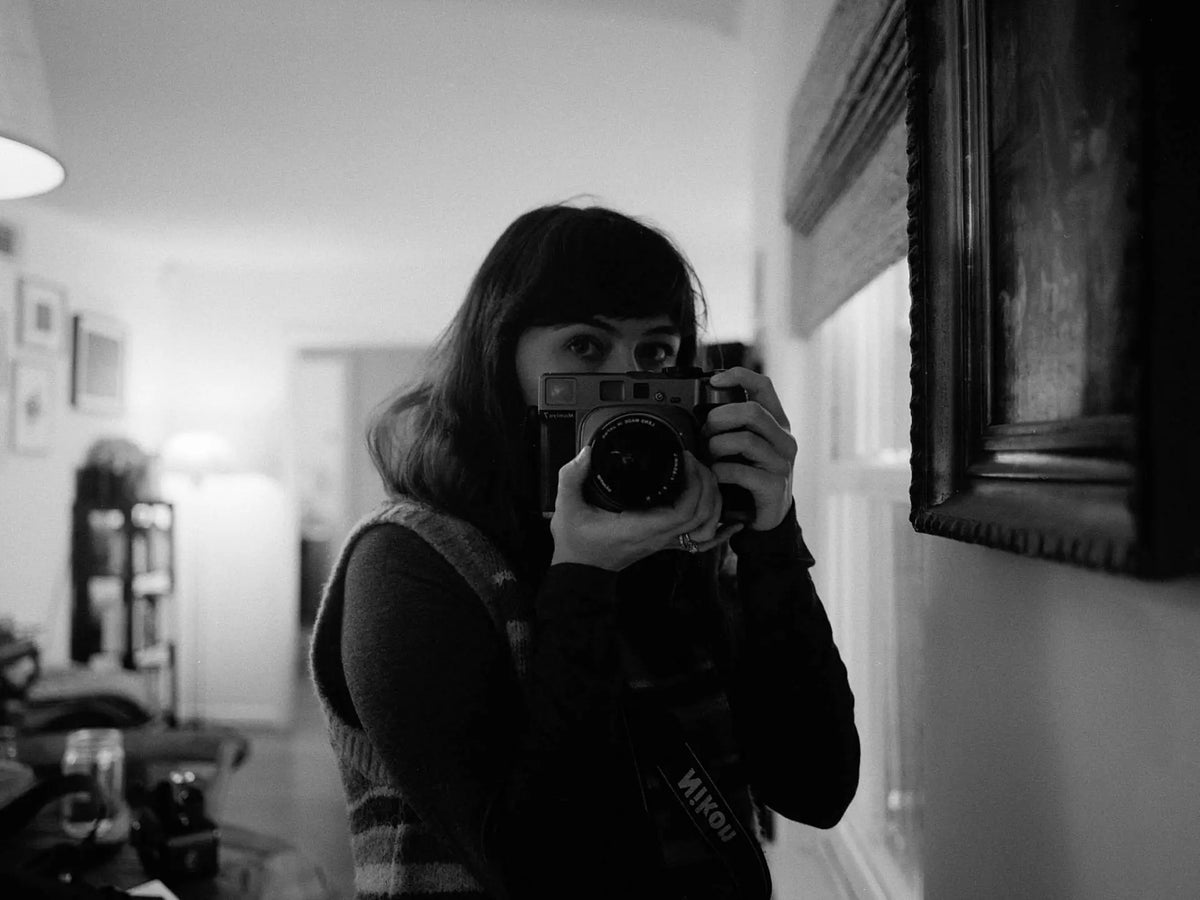 Hunter and her 35mm camera in her own