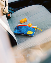 Man shooting woman with his 35mm film camera.